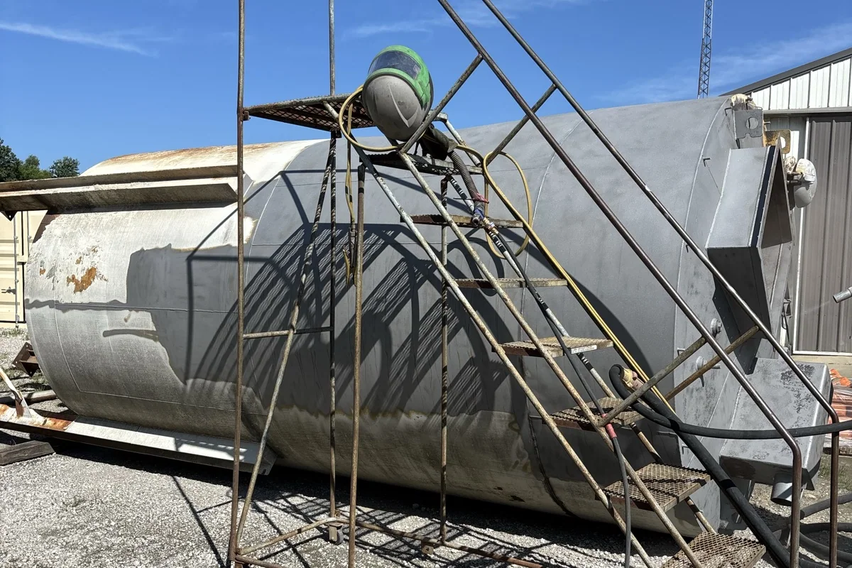 Bulk storage silo streaked and stained before blasting