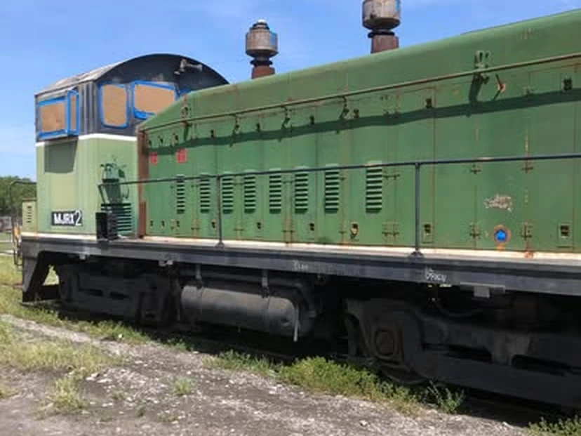 Locomotive in green paint before blasting